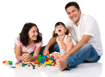 Mom, Dad and Child Playing with Lego